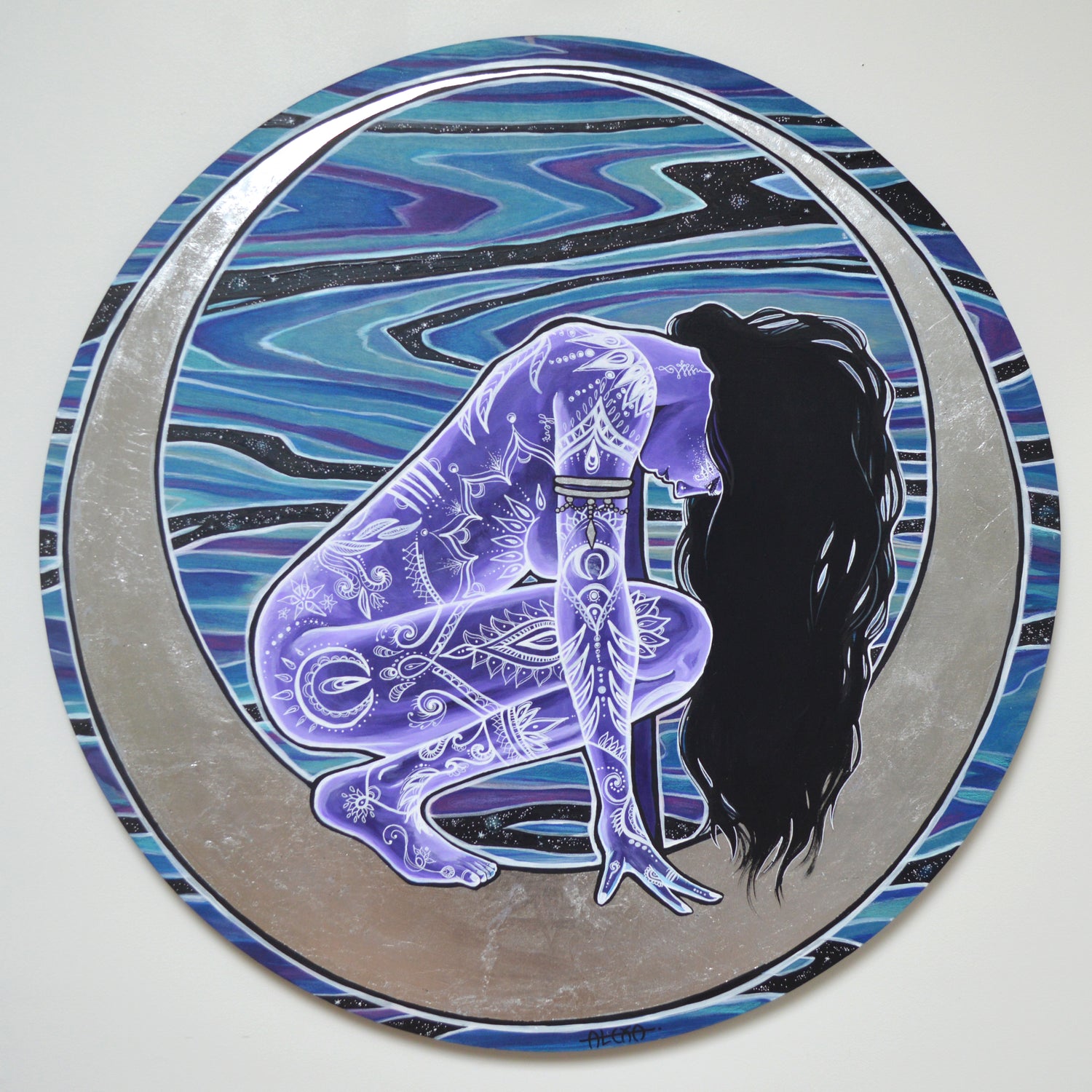 Goddess sits on crescent moon with tribal body paint and blue and purple wood grain swirling night sky, 36 inches diameter, original artwork by Alexa Porteous.